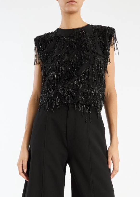 Person wearing Rotate Birger Christensen Sequined Sleeveless Top Black