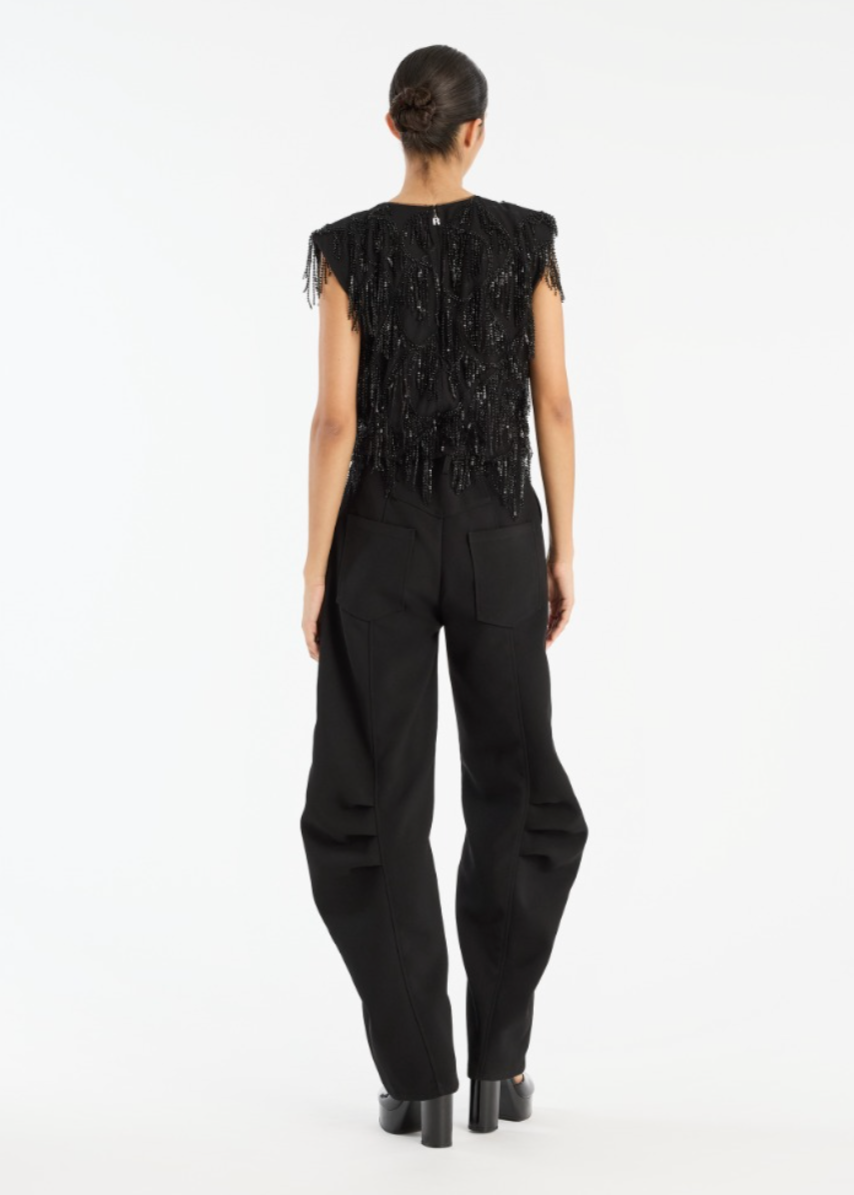 Person wearing Rotate Birger Christensen Sequined Sleeveless Top Black