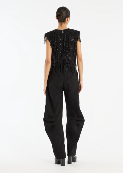 Person wearing Rotate Birger Christensen Sequined Sleeveless Top Black
