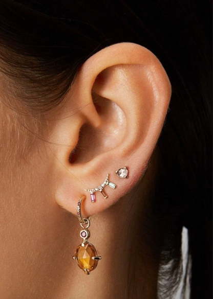 Person wearing SCOSHA Fine jewelry Ariel Rainbow Gemstone Moonbeam Stud