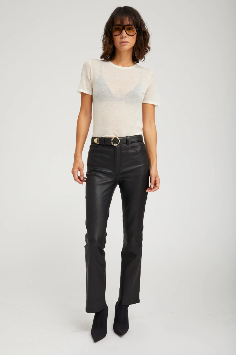 Person wearing SPRWMN 5 Pocket Ankle Flare Pants Black Leather