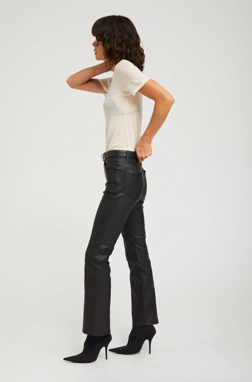 Person wearing SPRWMN 5 Pocket Ankle Flare Pants Black Leather
