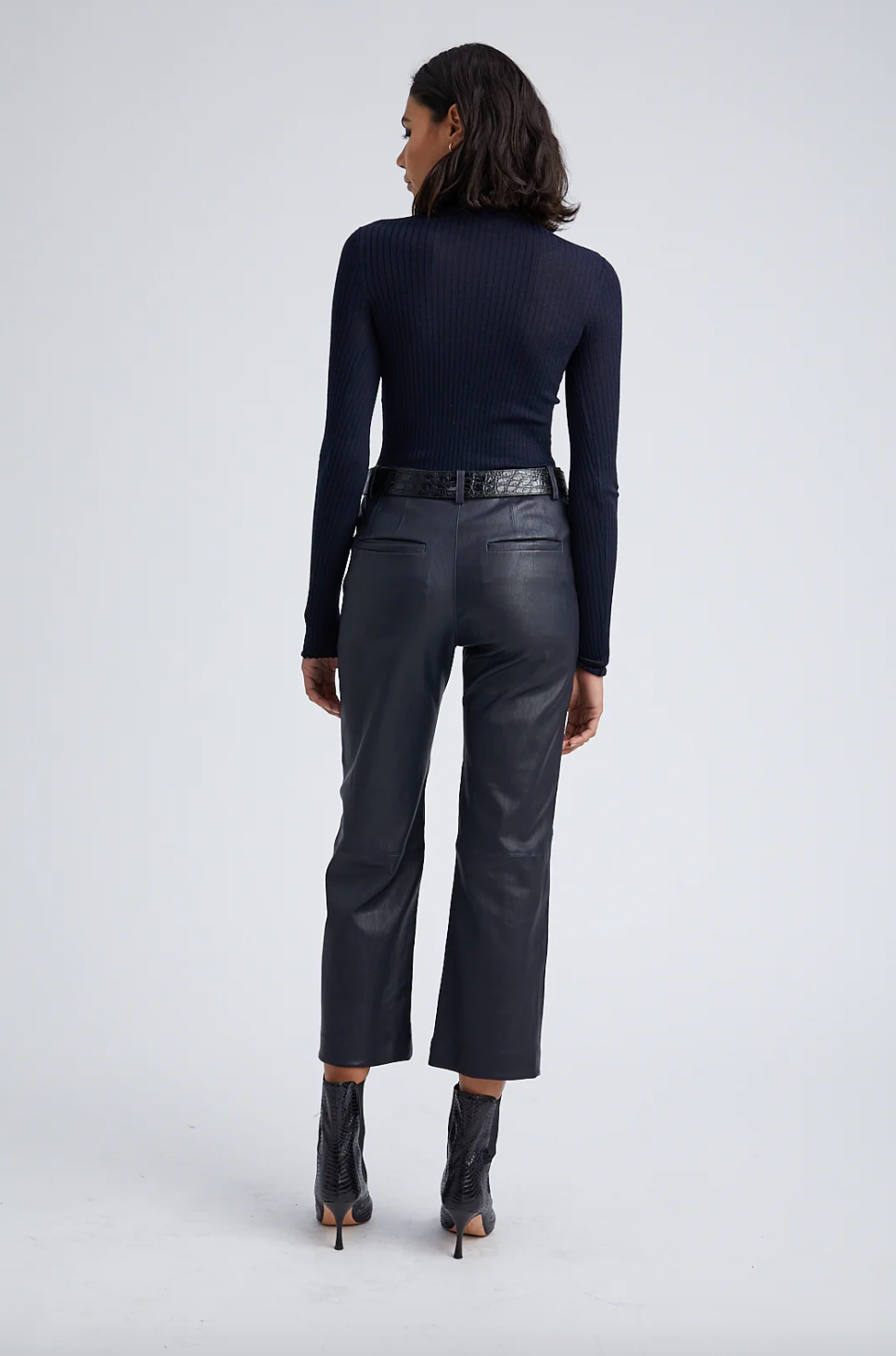 Person wearing SPRWMN Cropped Baggy Trousers in Navy