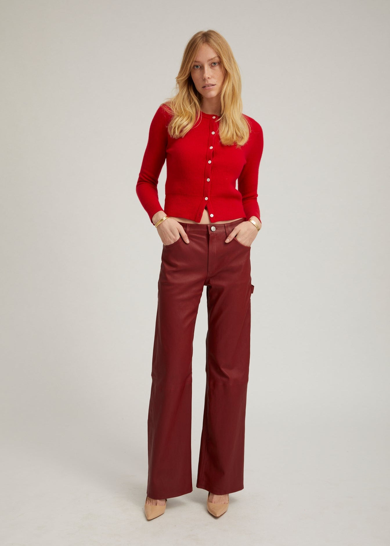 Person wearing SPRWMN Leather Carpenter Pants in Cherry