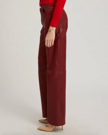 Person wearing SPRWMN Leather Carpenter Pants in Cherry