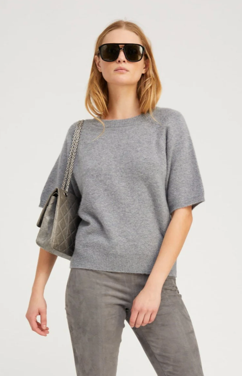 Person wearing SPRWMN womens Short Sleeve Raglan Cashmere Sweater tee gray