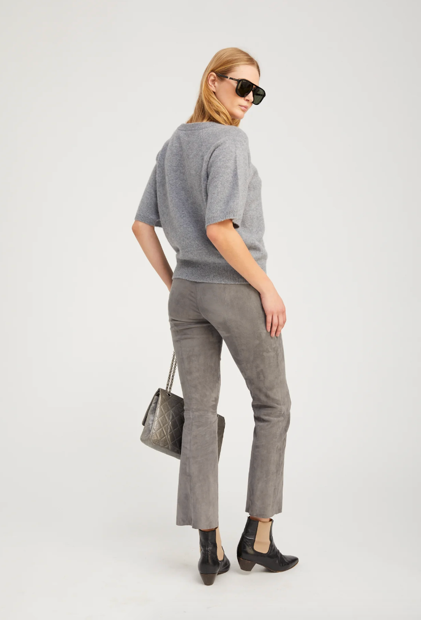 Person wearing SPRWMN womens Short Sleeve Raglan Cashmere Sweater tee gray