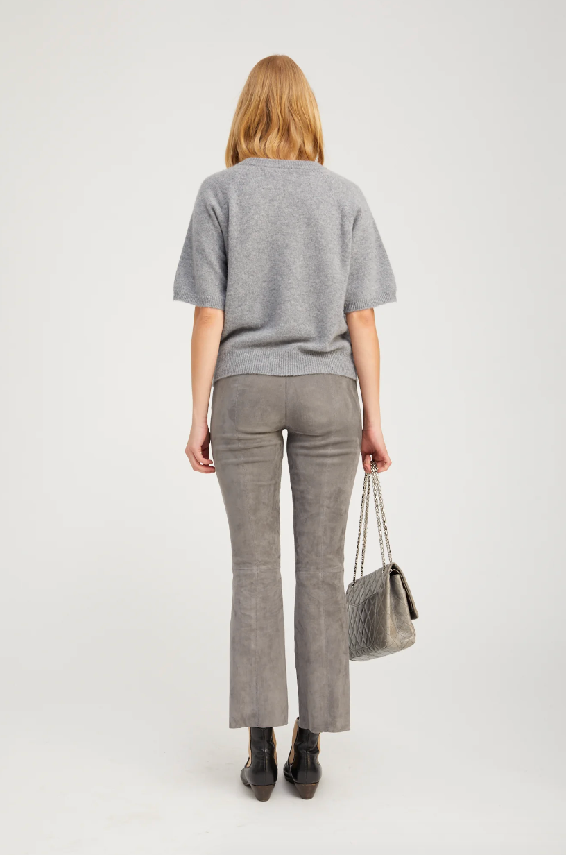 Person wearing SPRWMN womens Short Sleeve Raglan Cashmere Sweater tee gray