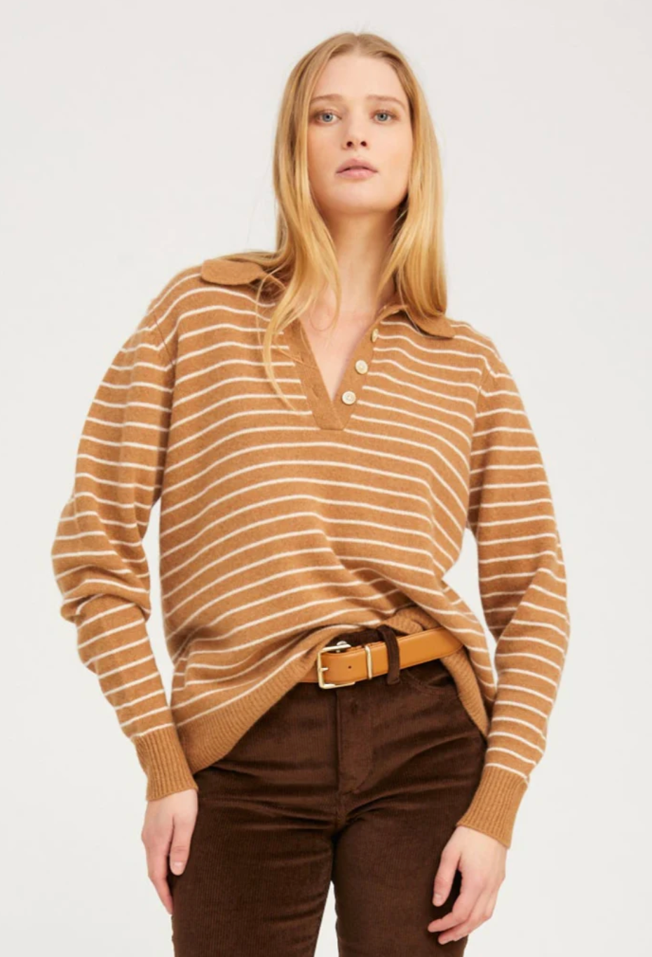 Person wearing SPRWMN womens Striped Cashmere Polo Sweater camel white stripe
