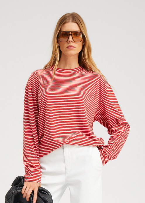 person wearing SPRwmn Long Sleeve Oversized Tee red stripes