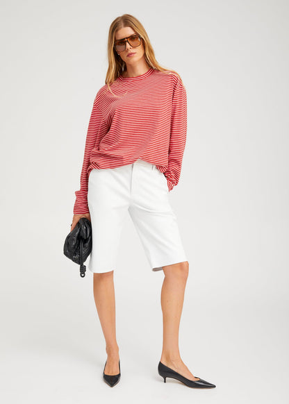 person wearing SPRwmn Long Sleeve Oversized Tee red stripes