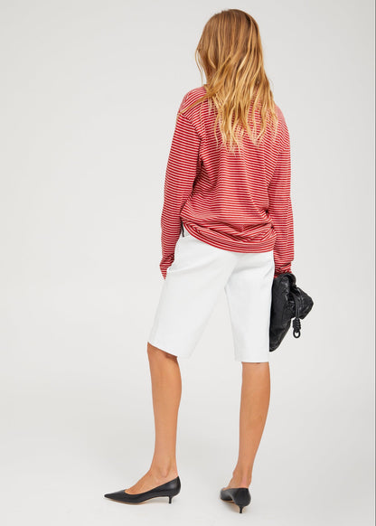 person wearing SPRwmn Long Sleeve Oversized Tee red stripes