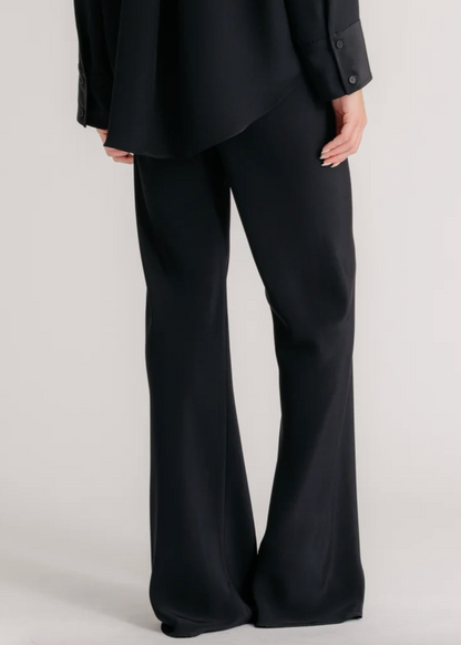 Person wearing Sablyn Rio Flared Bias Cut Pants Viscose Twill Black