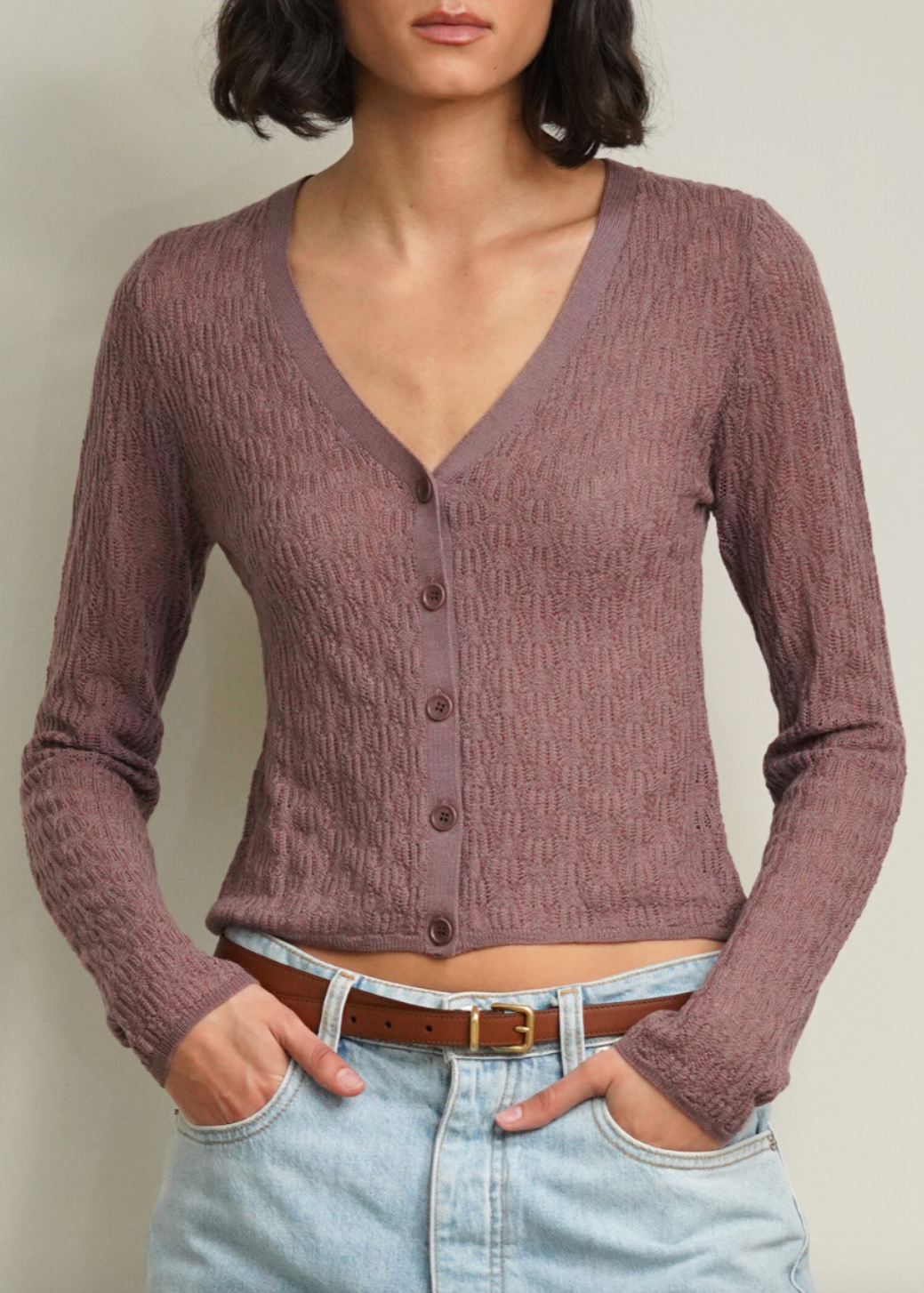 Person wearing Sablyn Vinni Pointelle Knit Cardigan in Dusty Violet