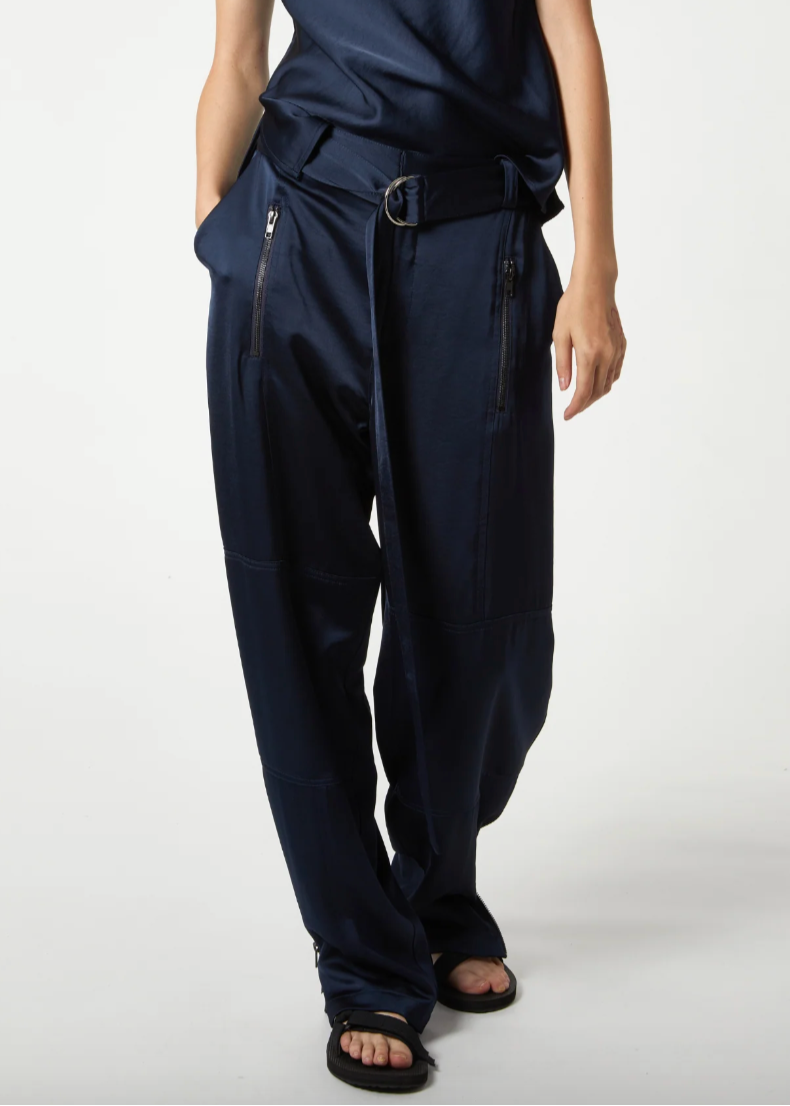 Person wearing Saint Art Courtney Charmeuse Pant in Navy