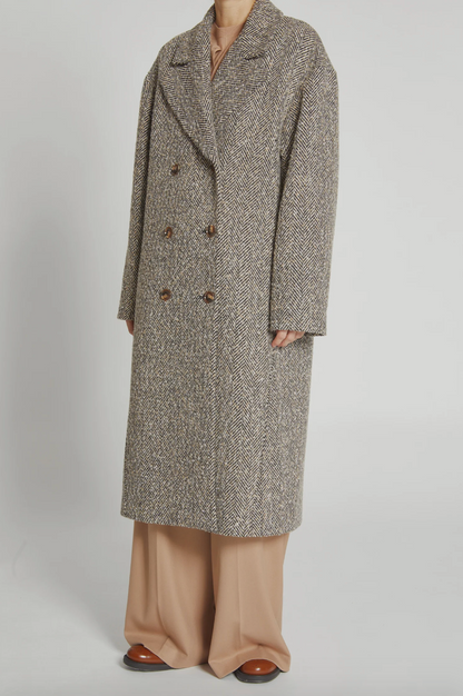 Person wearing Saint Art Dayana Herringbone Coat