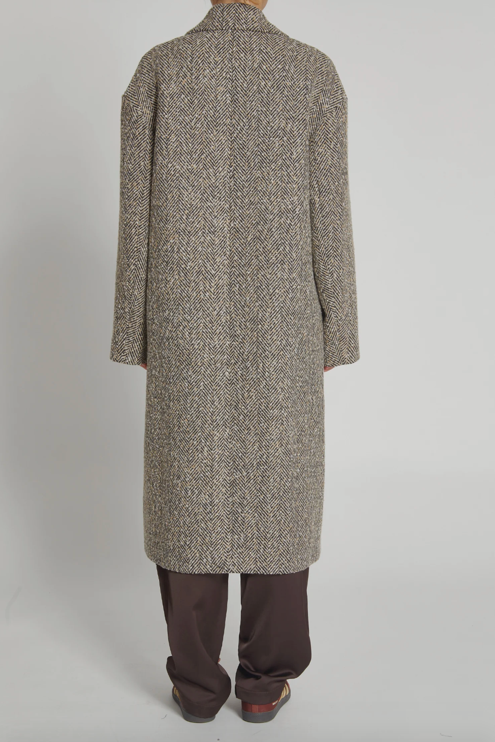 Person wearing Saint Art Dayana Herringbone Coat