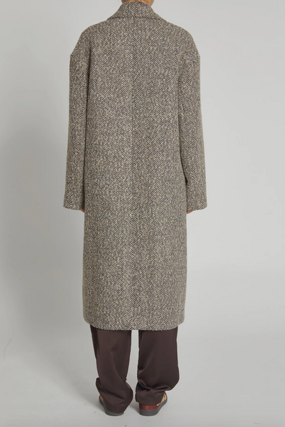 Person wearing Saint Art Dayana Herringbone Coat