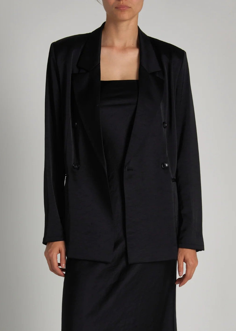 Person wearing Saint Art womens Adalee Charmeuse Blazer in Black