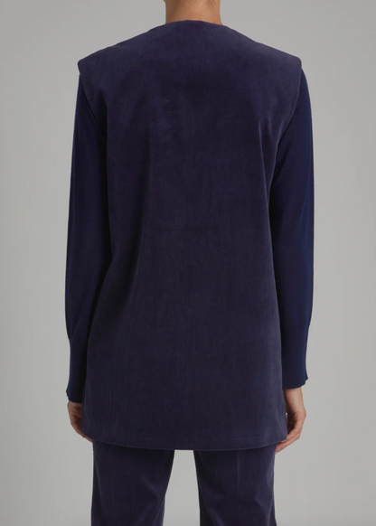 Person wearing Saint Art womens Andi Corduroy Vest in Navy