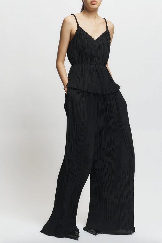 Person wearing Saint Art womens Hendrix Pleated Pants Black