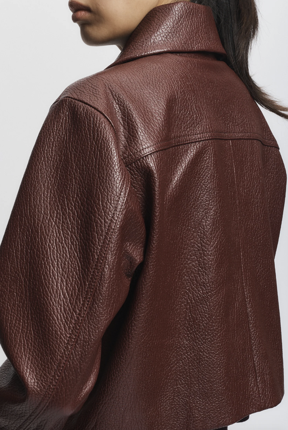 Person wearing Saint Art womens Lomand Crinkle Leather Jacket in Burgundy