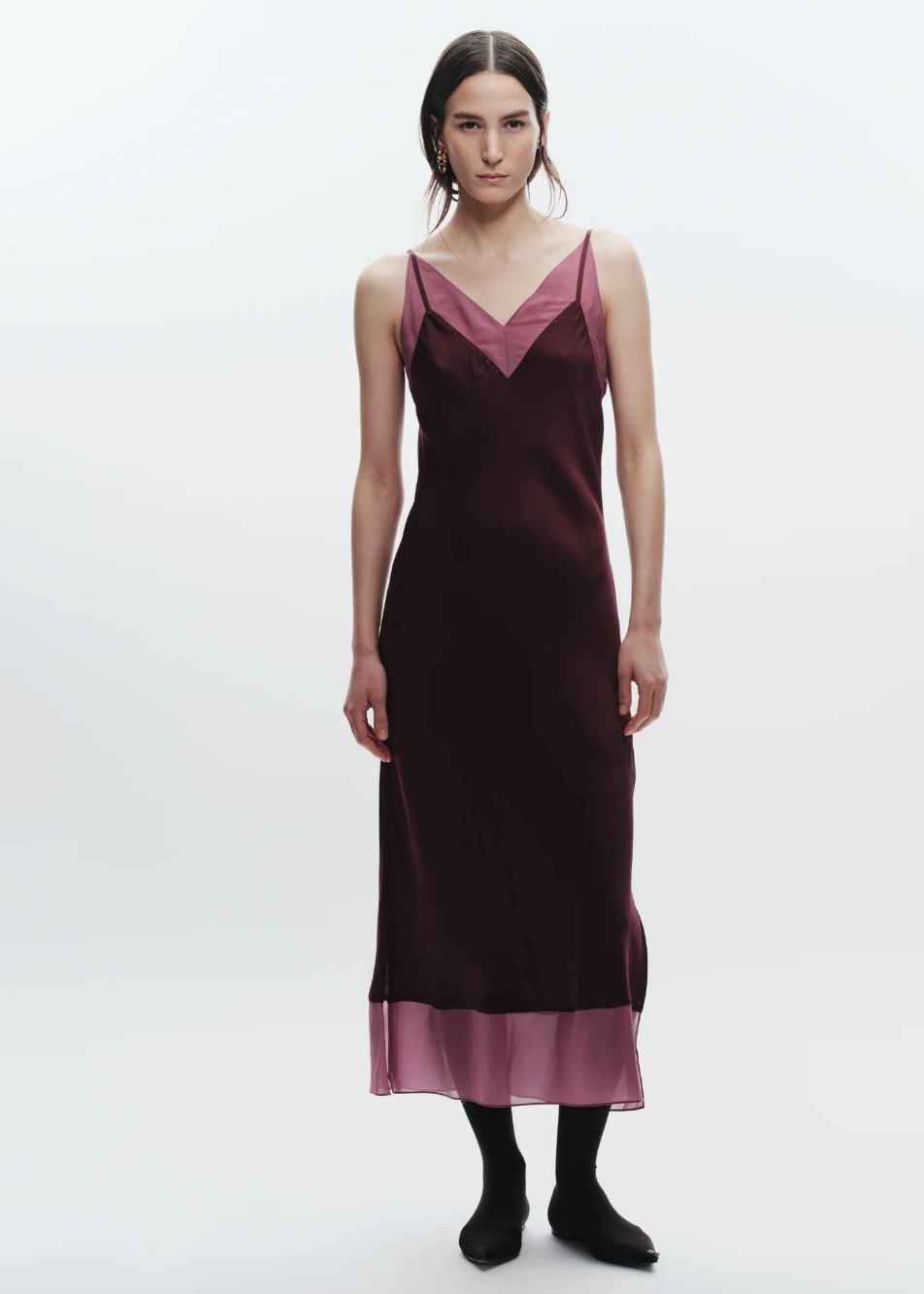 Person wearing Saint Art womens viscose Vinza Slip Dress in grape purple red