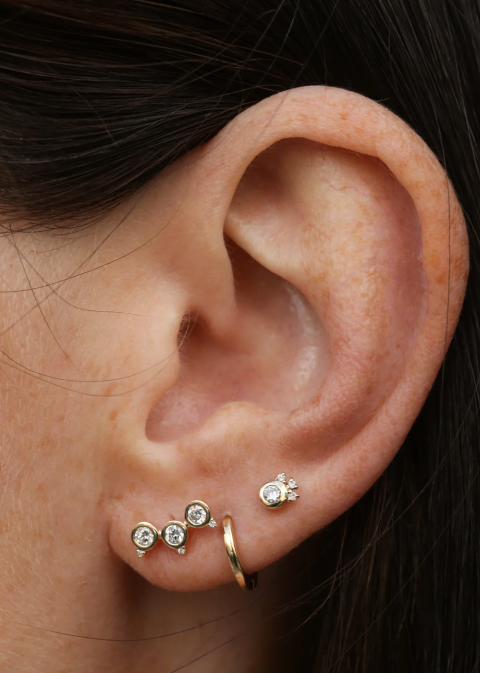 Person wearing Scosha fine jewelry 10k yellow gold Pinnacle Stud with Diamonds (Single Earring)