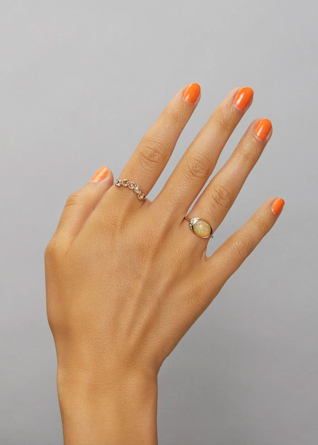 Person wearing Scosha fine jewelry 14k yellow gold Indira Ring with Champagne Diamonds