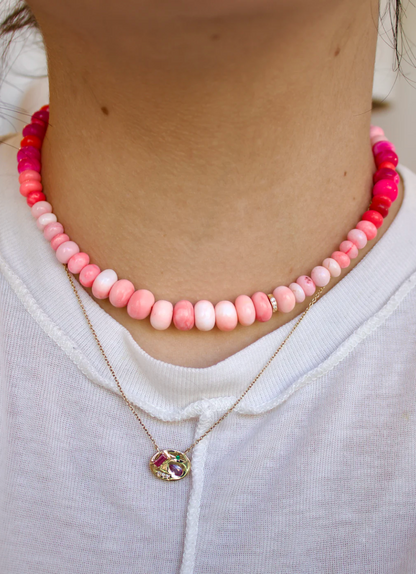 Person wearing Scosha fine jewelry gold Candy Gem Necklace in Gelato Pink
