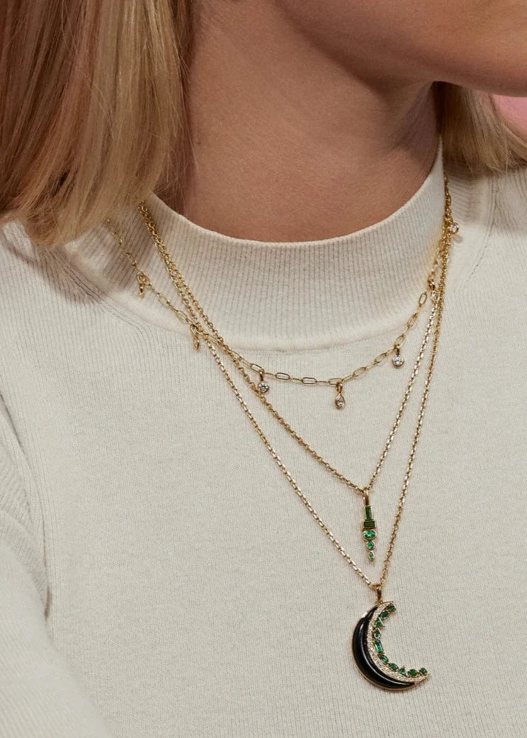 Person wearing Sorellina fine jewelry 18k yellow gold diamond emerald Crescent Moon Inlay Pendant Necklace with Onyx