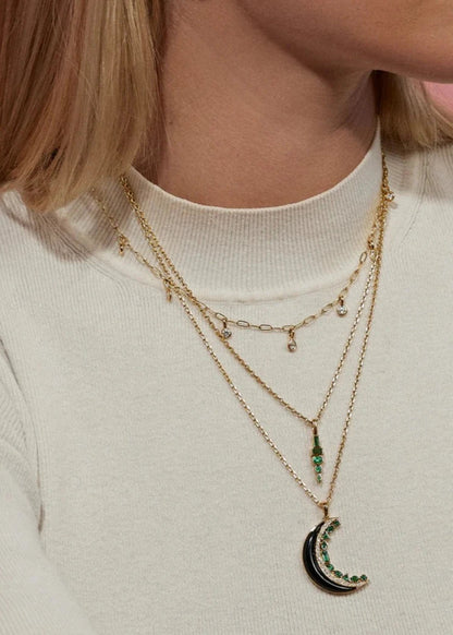Person wearing Sorellina fine jewelry 18k yellow gold diamond emerald Crescent Moon Inlay Pendant Necklace with Onyx