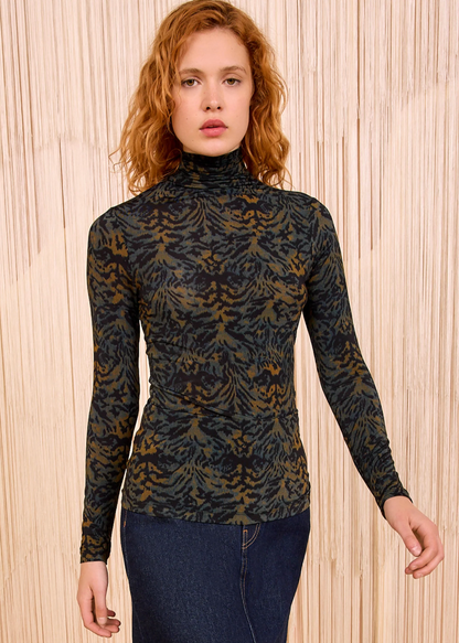 Person wearing Ulla Johnson Aurelia Jersey Turtleneck in Desert Jasper