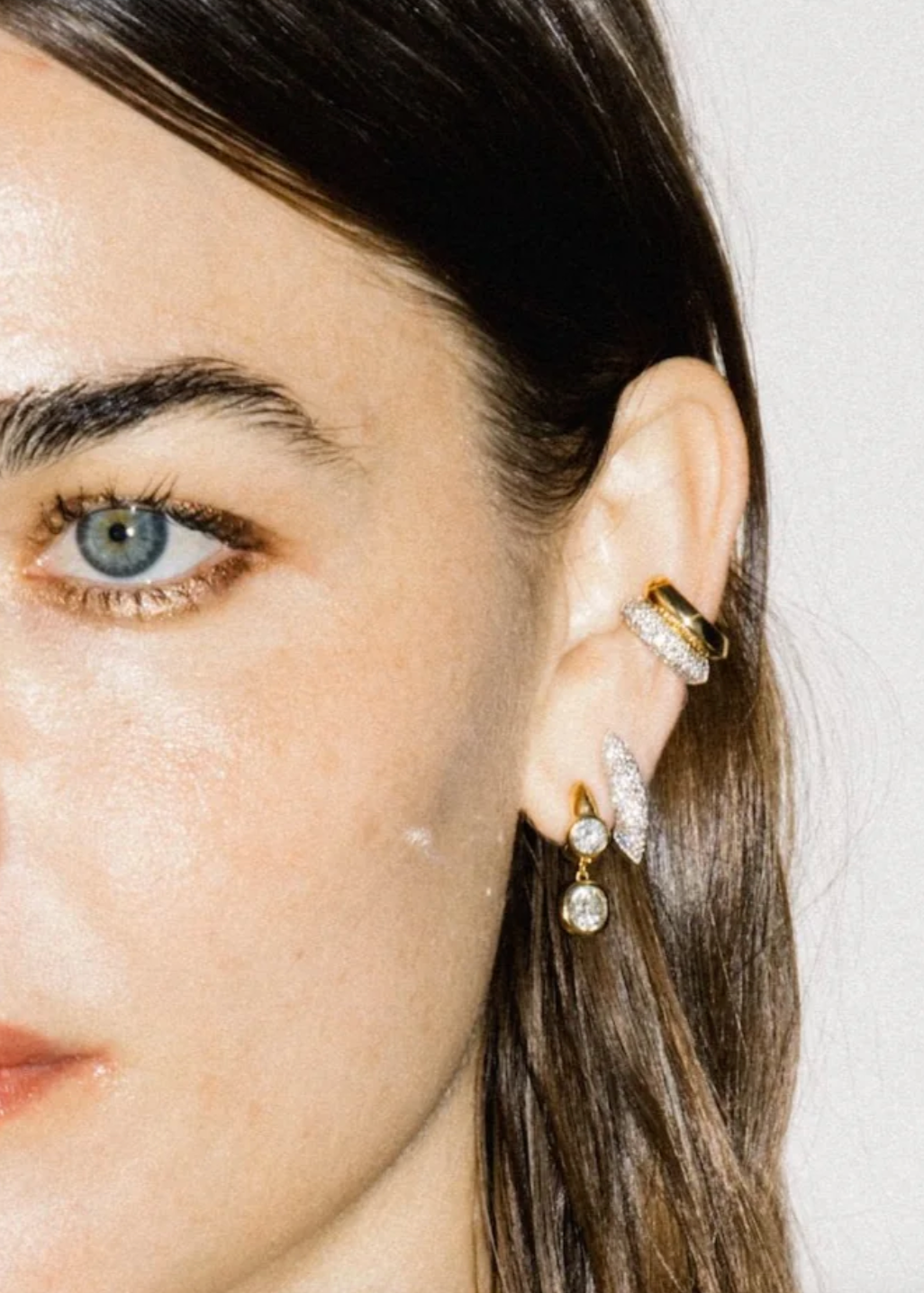 Person wearing Uniform Object fine jewelry 18k yellow gold Diamond Pavé Shard Ear Cuff