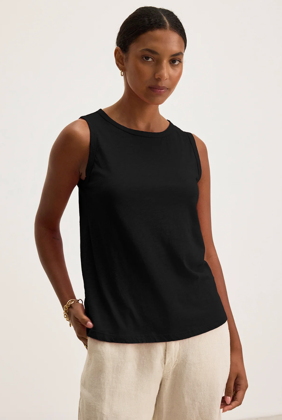 Person wearing Velvet Taurus Tank Top in Black