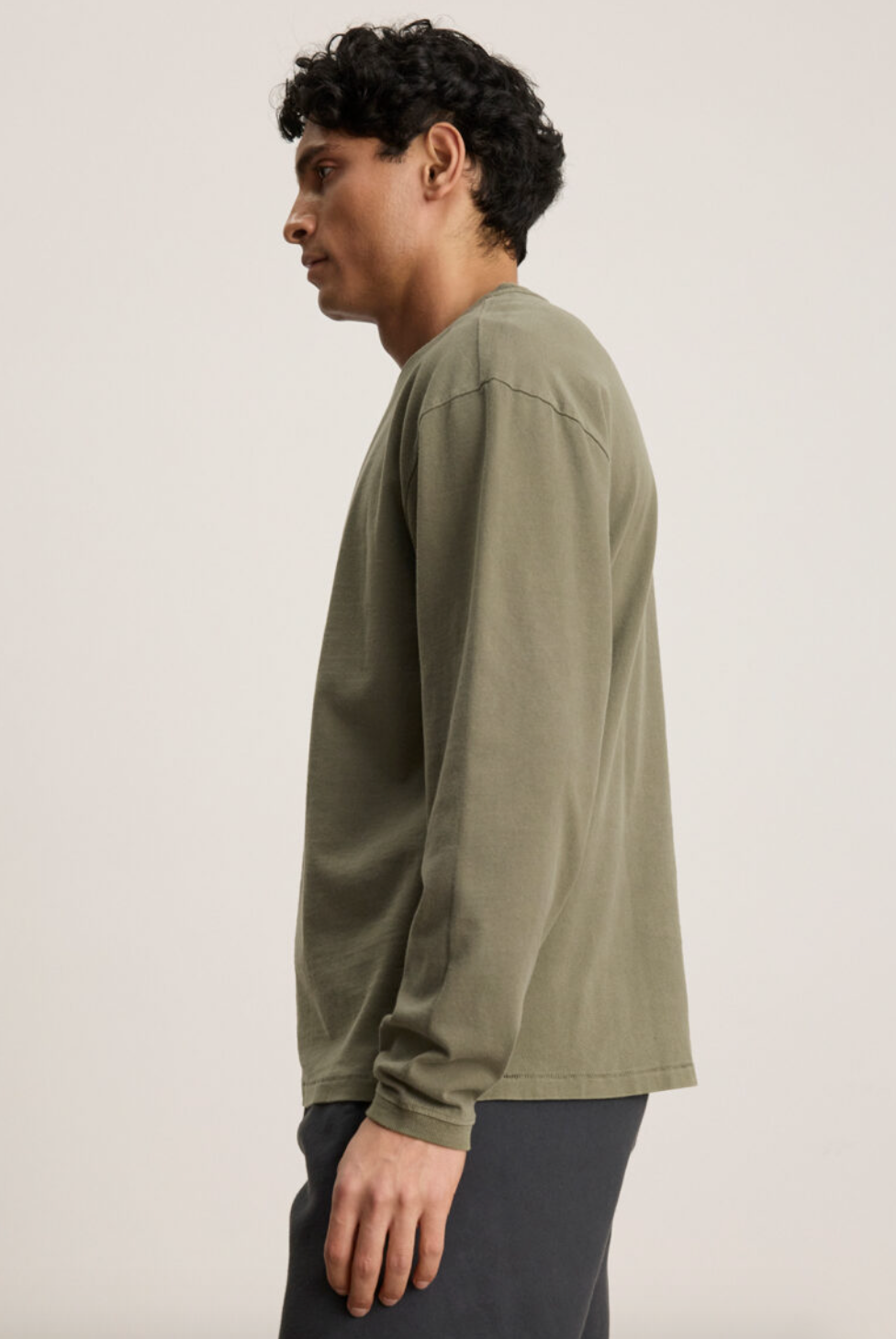 Person wearing Velvet tees mens Finnick Long Sleeve Crew cactus green