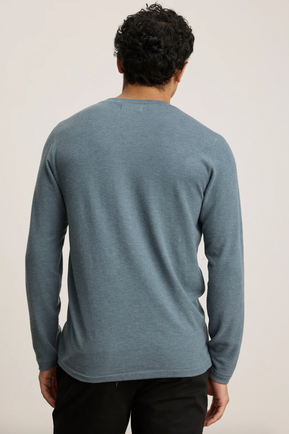 Person wearing Velvet tees mens Ryland Long Sleeve Henley in Anthracite