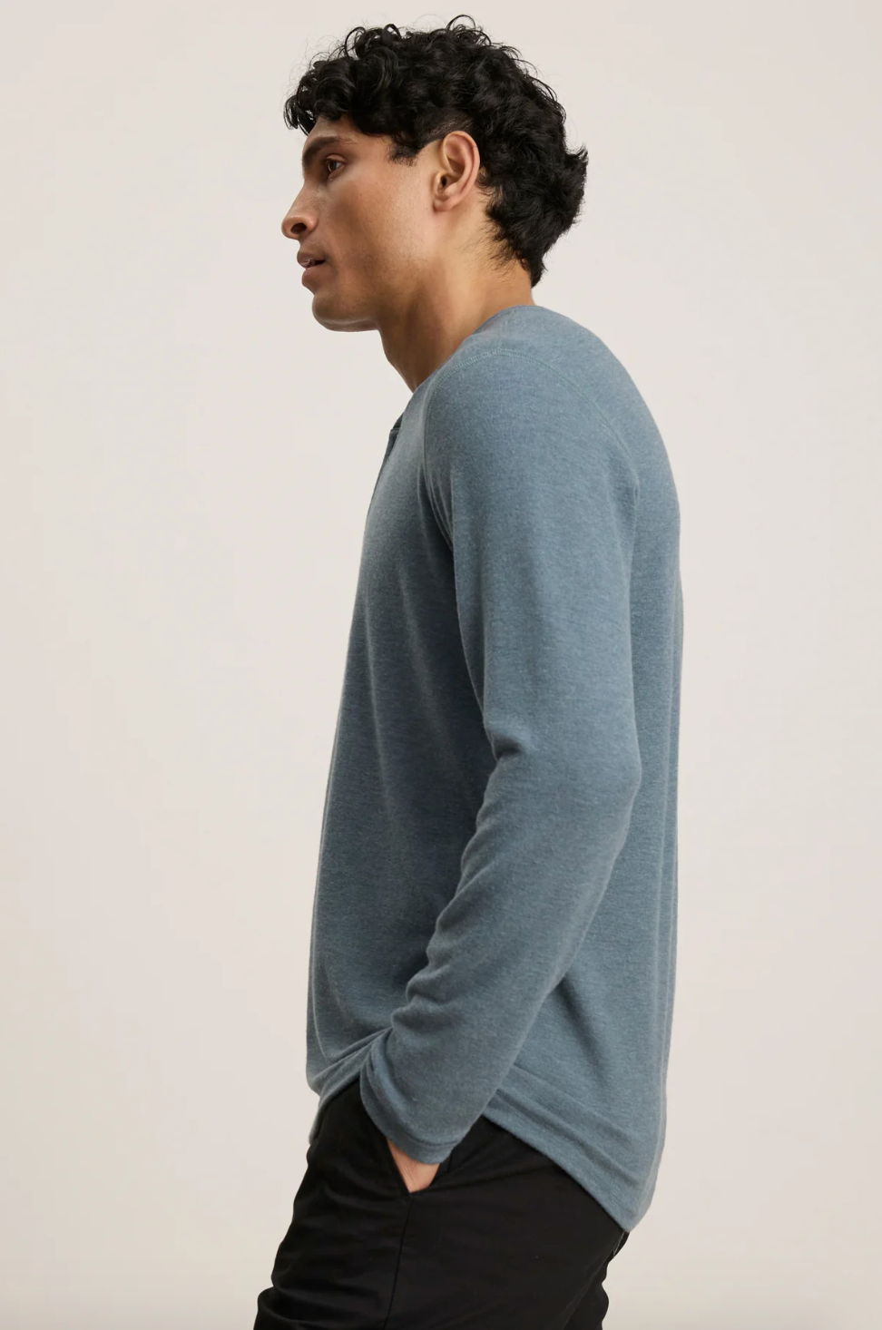 Person wearing Velvet tees mens Ryland Long Sleeve Henley in Anthracite