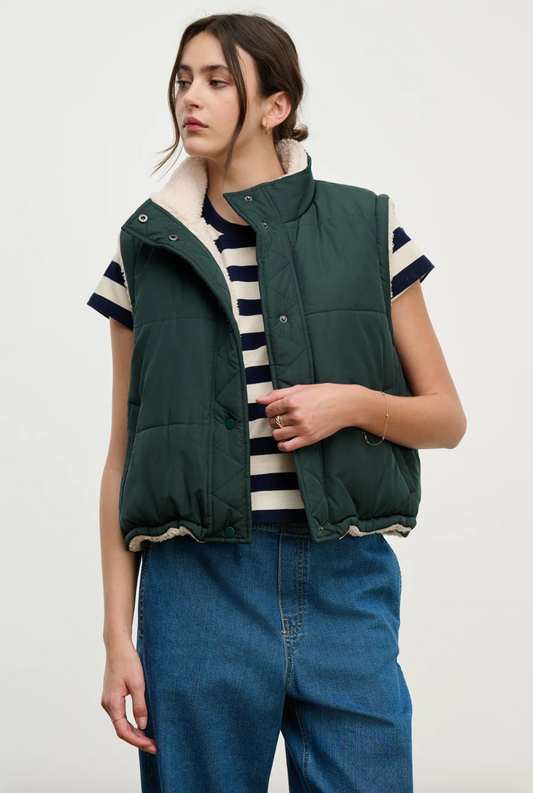 Person wearing Velvet tees womens Cathy Puffy Sherpa Reversible Vest Alpine Green