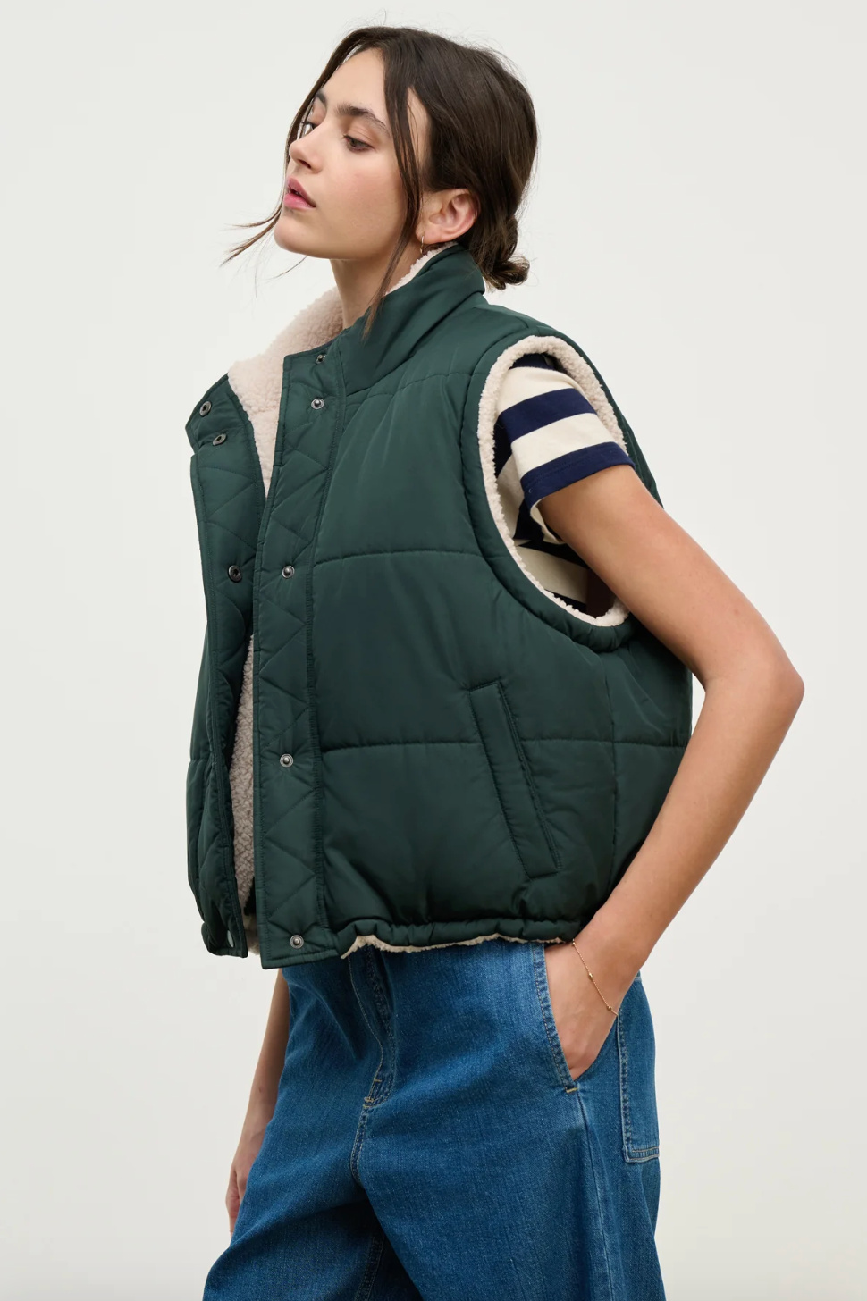 Person wearing Velvet tees womens Cathy Puffy Sherpa Reversible Vest Alpine Green
