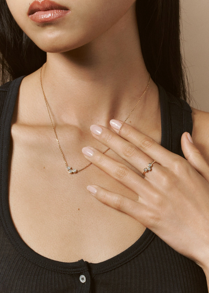 Person wearing Viltier fine jewelry Petite Clique Diamond Necklace
