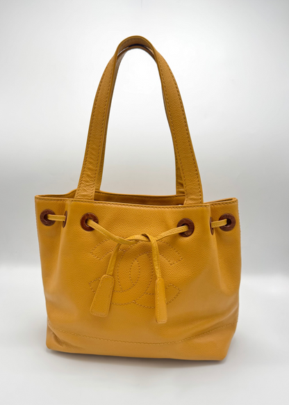 Vintage Chanel Mustard Caviar Drawstring Shoulder Tote with Tortoise Grommets