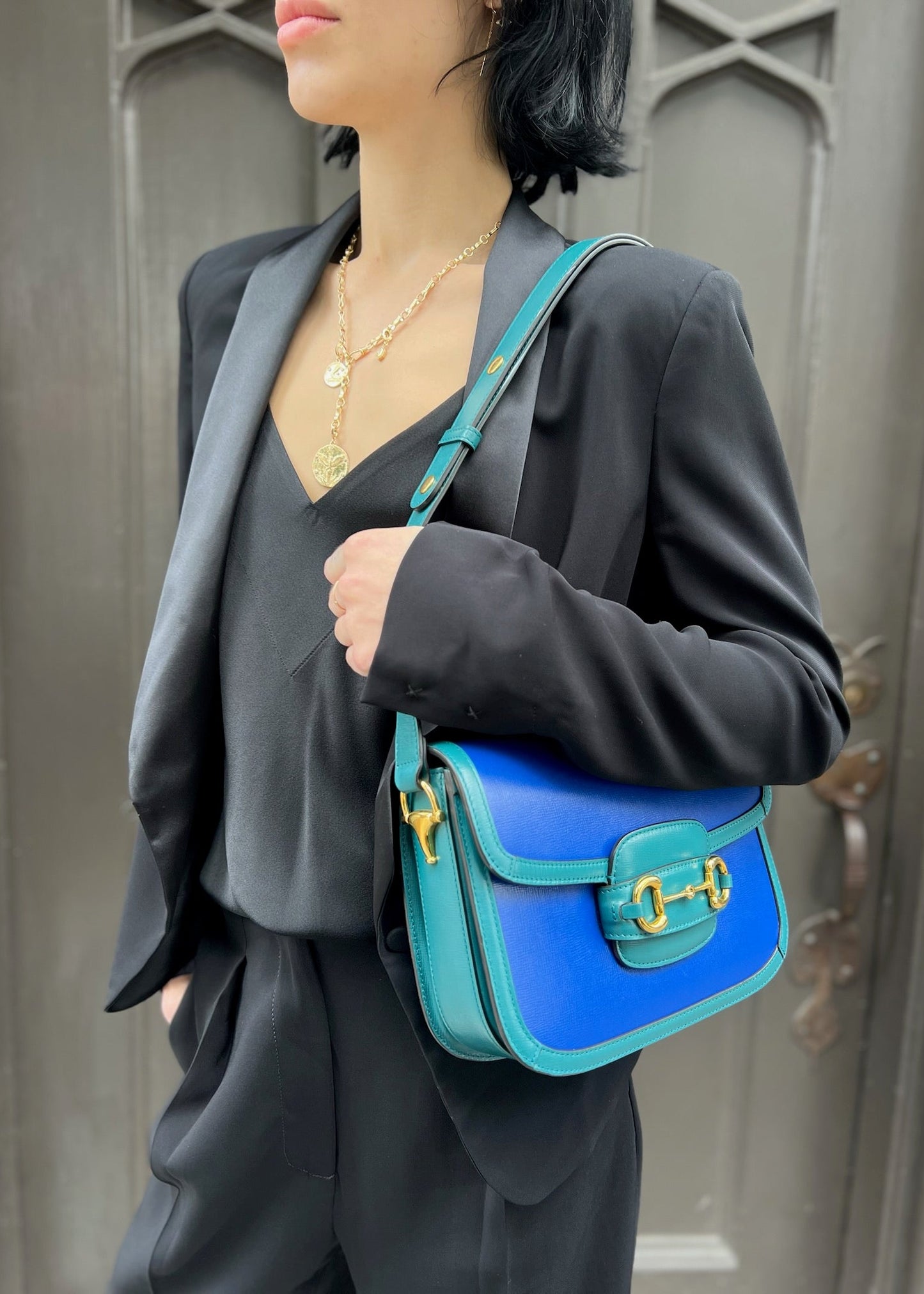 person wearing Vintage Gucci Horsebit 1955 Medium Shoulder Bag