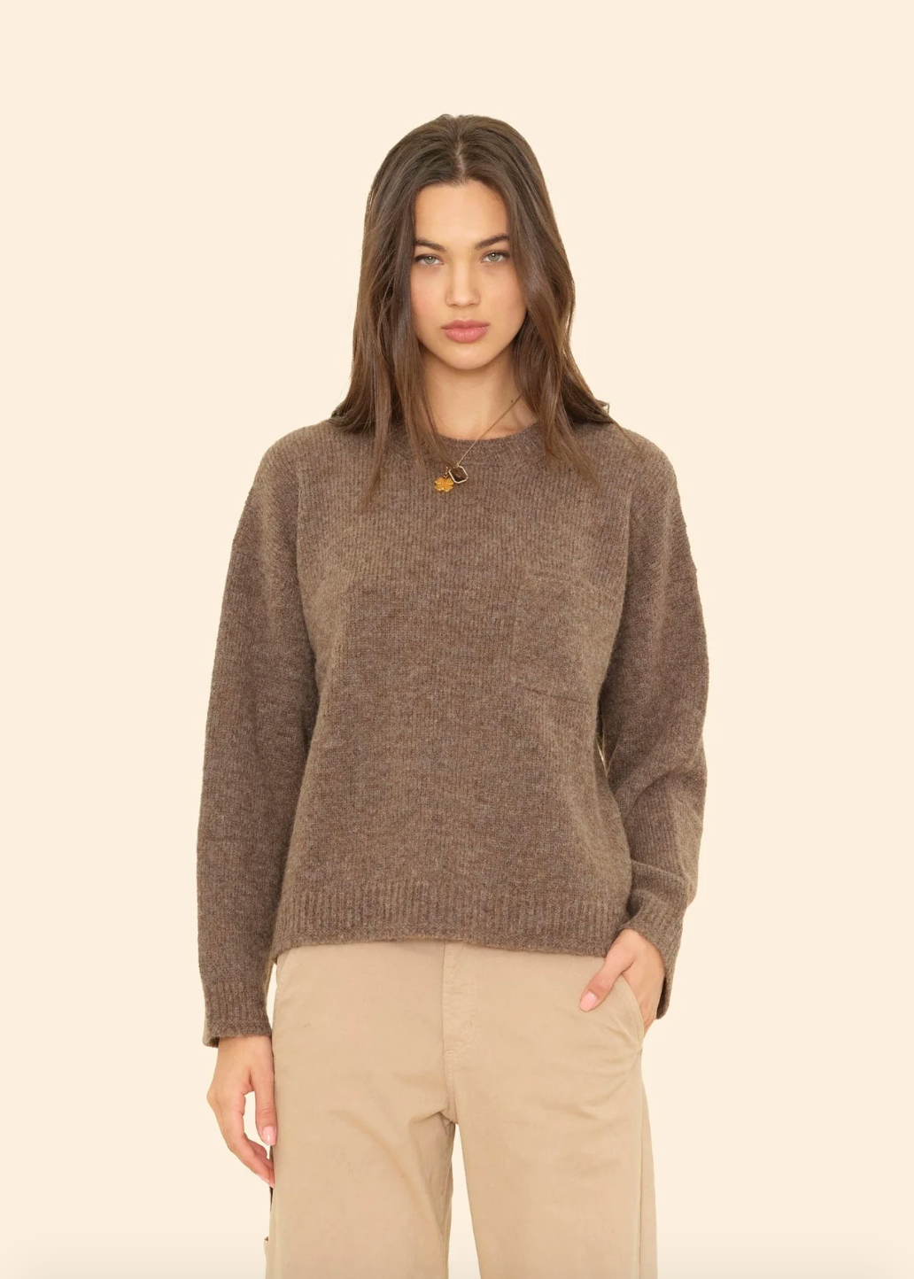 Person wearing Xirena Julien Sweater in Taupe