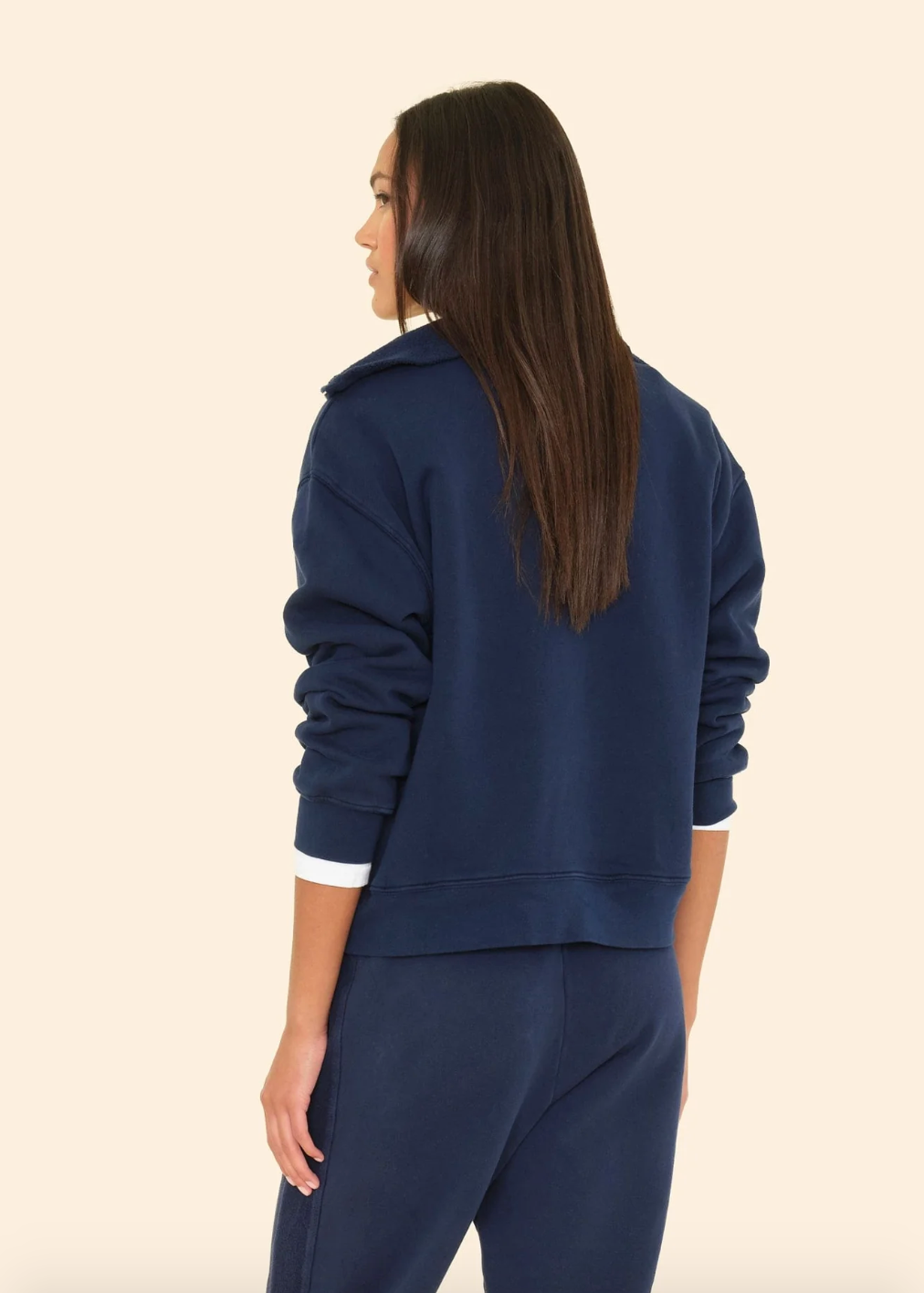 Person wearing Xirena Kat Sweatshirt in Navy