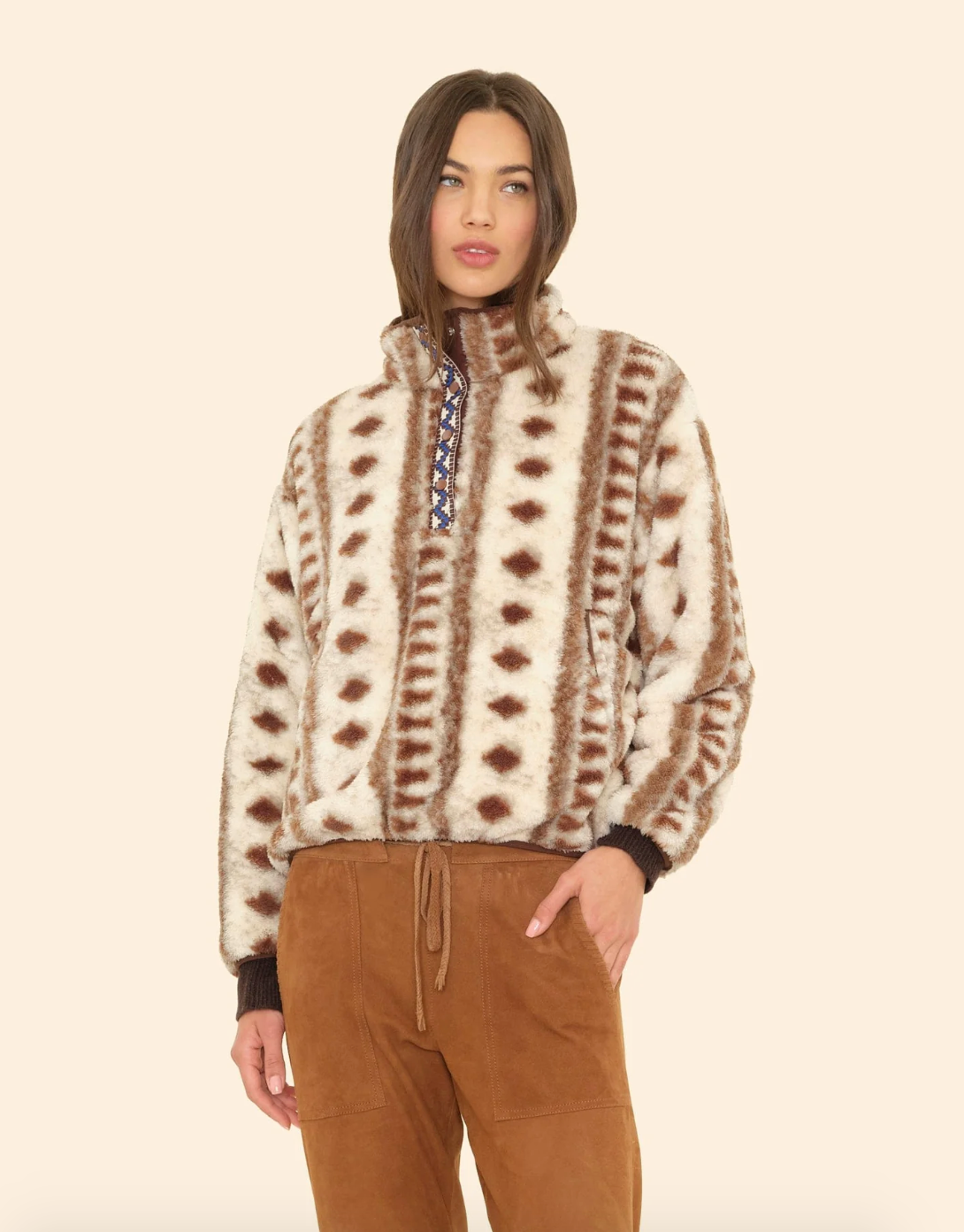 Person wearing Xirena Ridge Fleece Pullover in Diamond Tribe