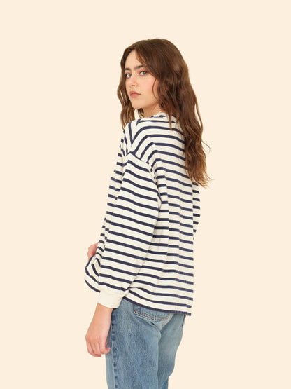 Person wearing Xirena womens Honor Sweatshirt in Natural Stripe