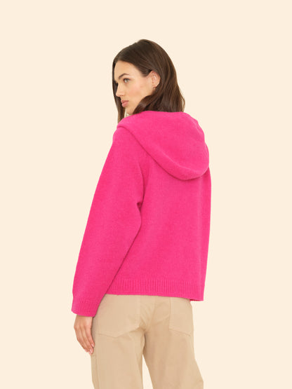 Person wearing Xirena womens Kayla Sweater in Brilliant Pink