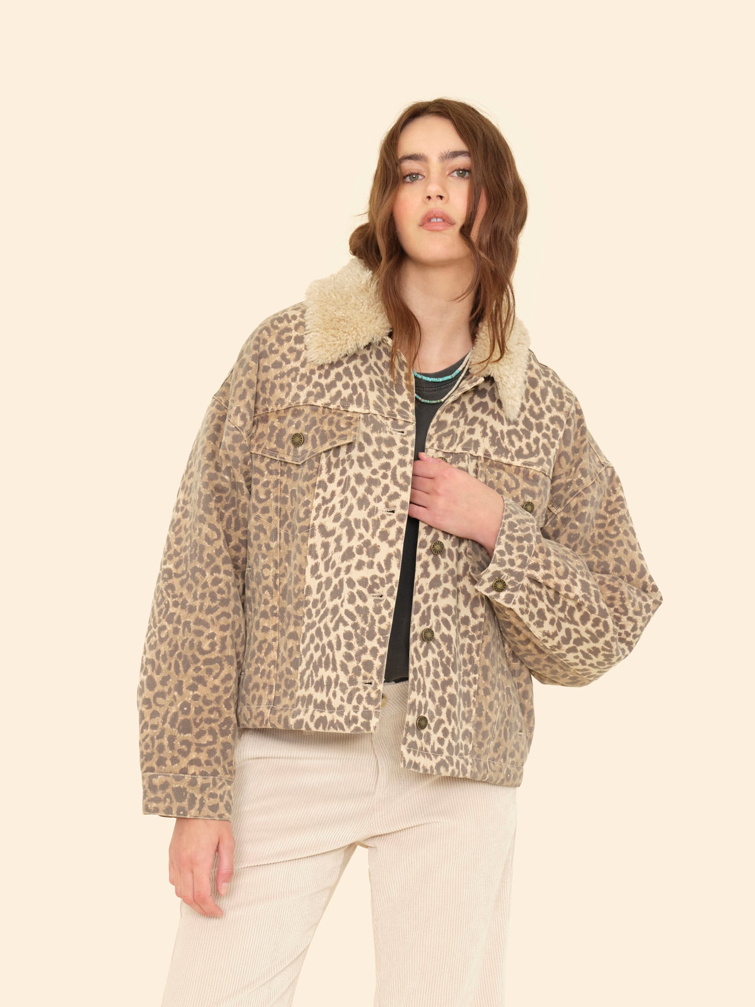 Person wearing Xirena womens Ryko Jacket in sable print