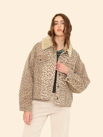 Person wearing Xirena womens Ryko Jacket in sable print